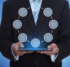 man-with-holographic-tablet-min man-with-holographic-tablet-min